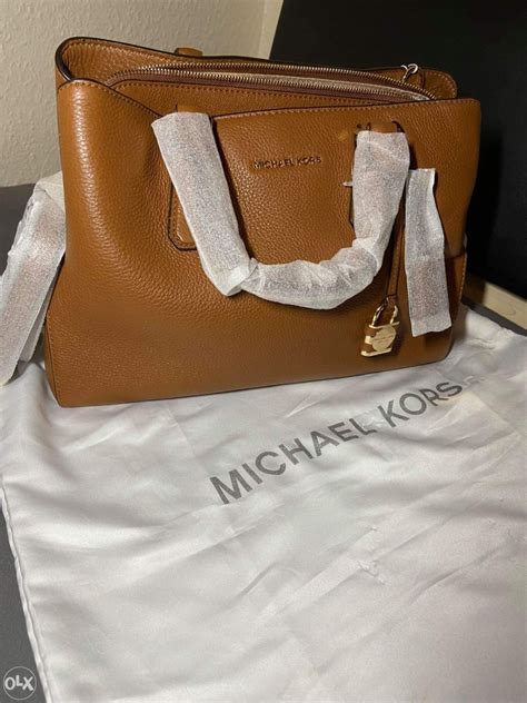 michael kors torbe kako prepoznati original|michael kors personal life.